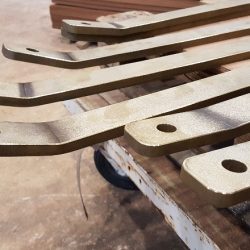 Chain-plates following drilling and bending to correct angles